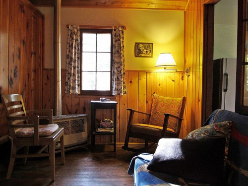 Cabin 3's living room has cozy places for you to sit and relax.